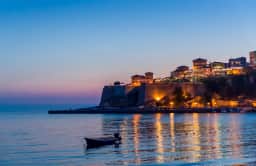 Ulcinj Old Town on its rock above the sea after sunset