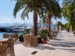 Pedestrian promenade beside yachts at Porto Montenegro
