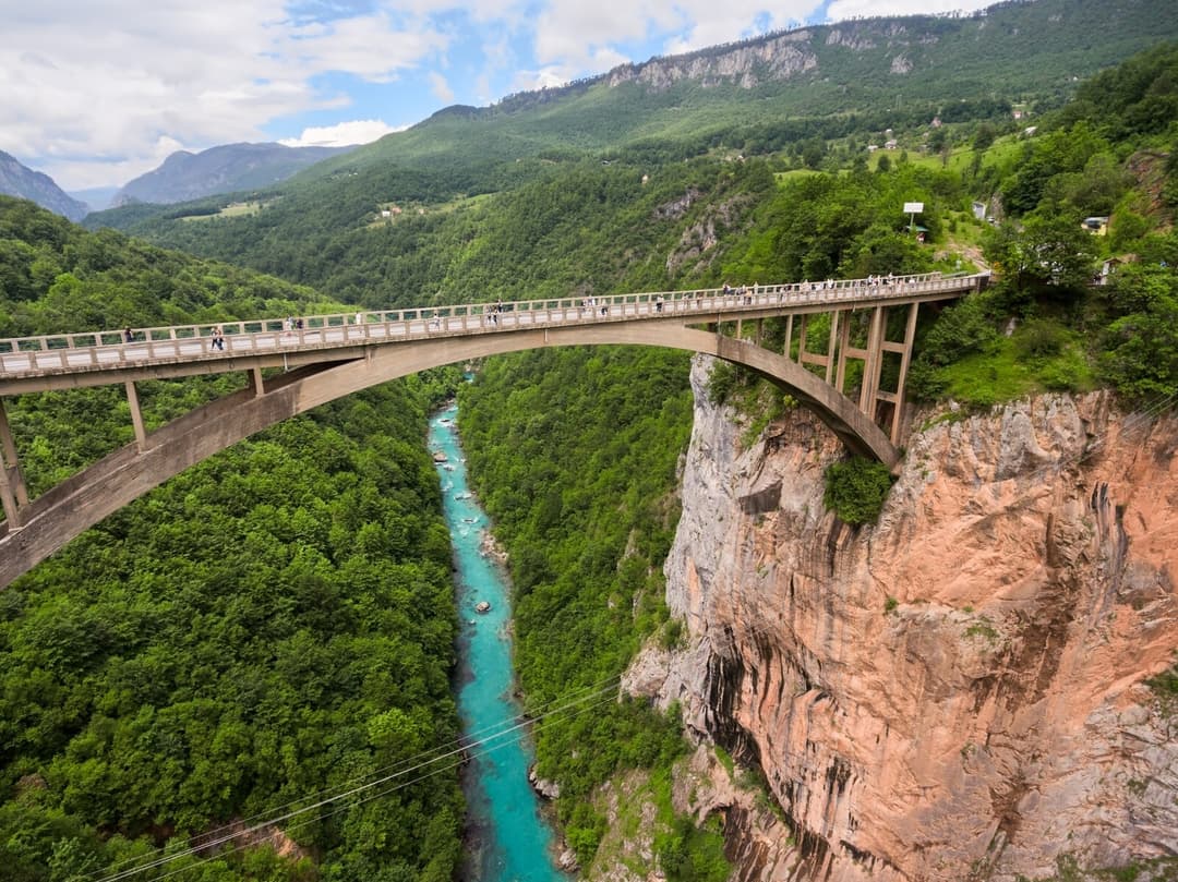 Durdevica Tara Bridge spanning the deep Tara River Canyon with turquoise water far below