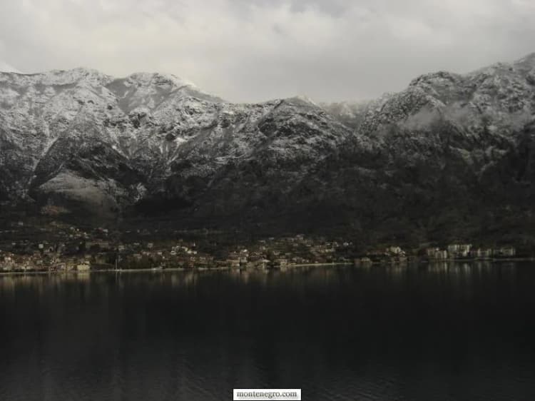 Risan waterfront and mountains in a quiet winter view