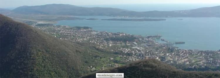 Wide view across Tivat Bay toward surrounding mountains