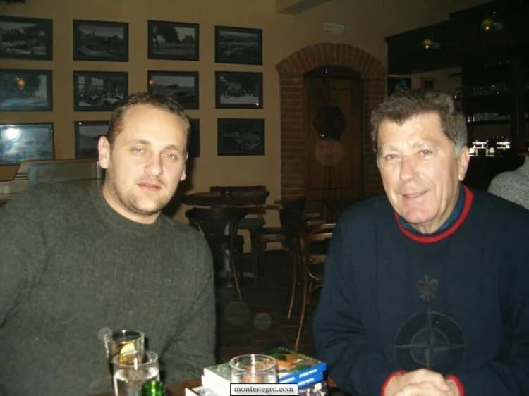 Gordan Stojović and a research contact in an archived Montenegro.com photograph