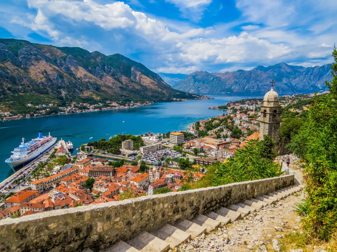 The view down over Kotor's rooftops and the bay from the fortress walls above the town