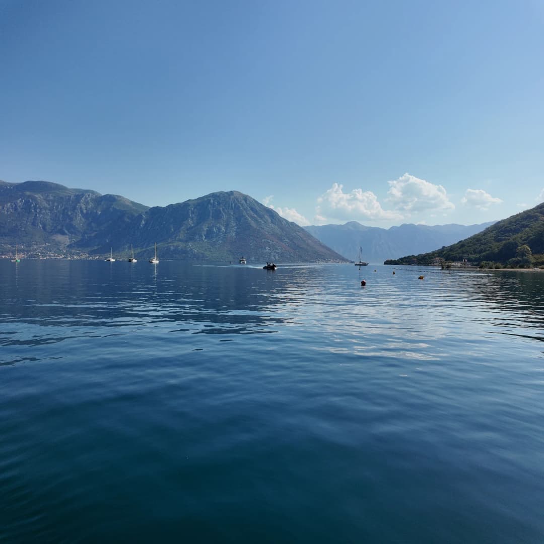 Looking down the bay from Morinj towards Perast on a still morning