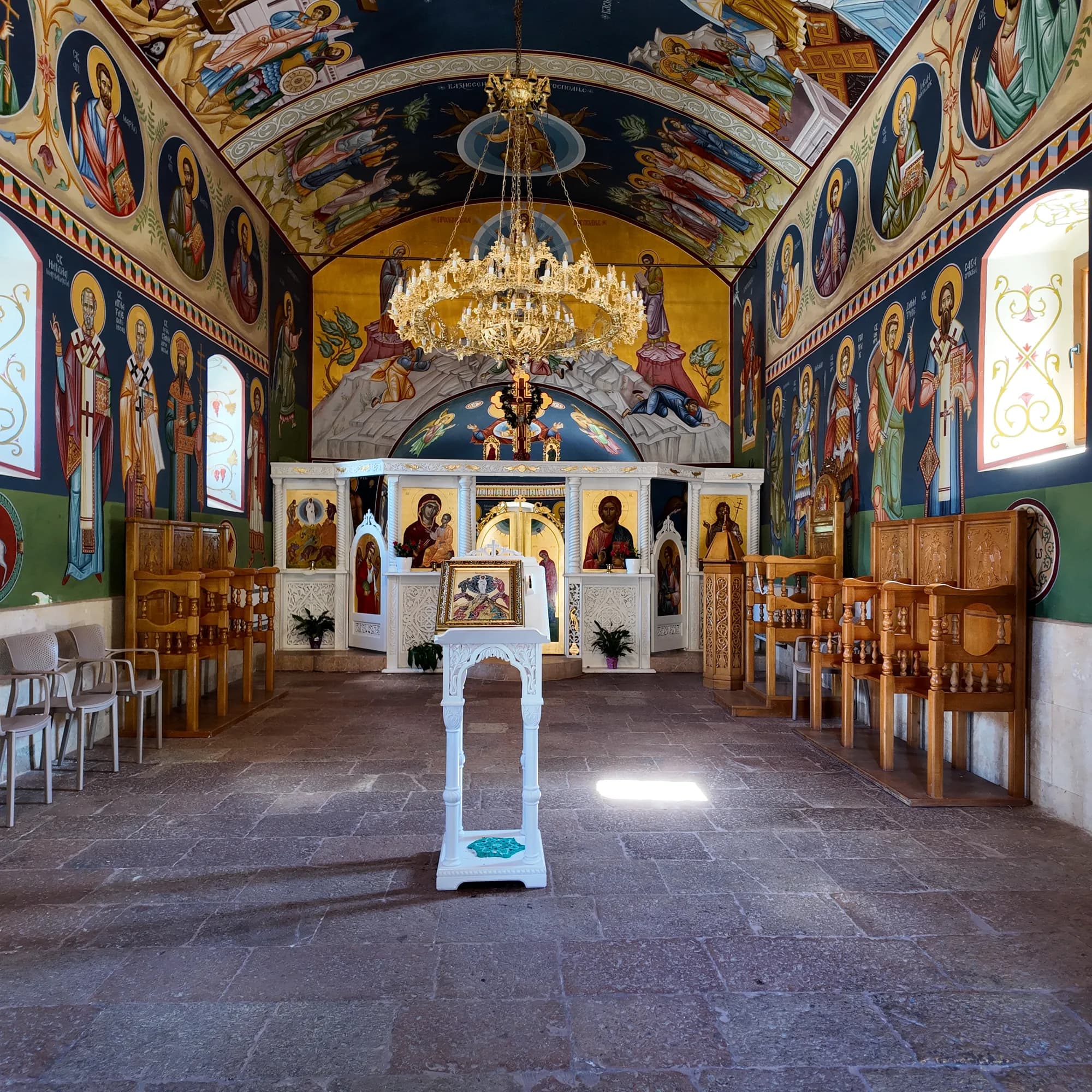 Inside the Transfiguration church at Sutorina: new frescoes from floor to vault and the iconostasis at the east end