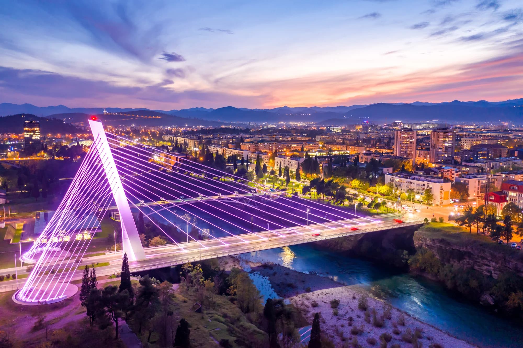 The Millennium Bridge over the Morača lit at dusk, Podgorica