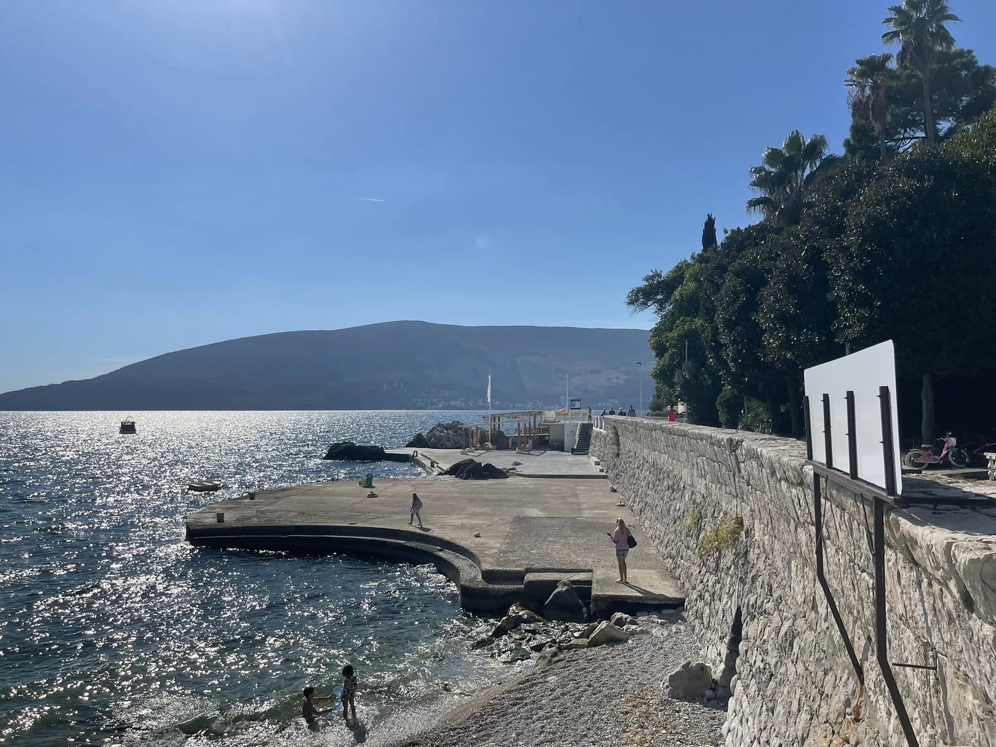 The stone swimming platform below the Pet Danica promenade at Savina
