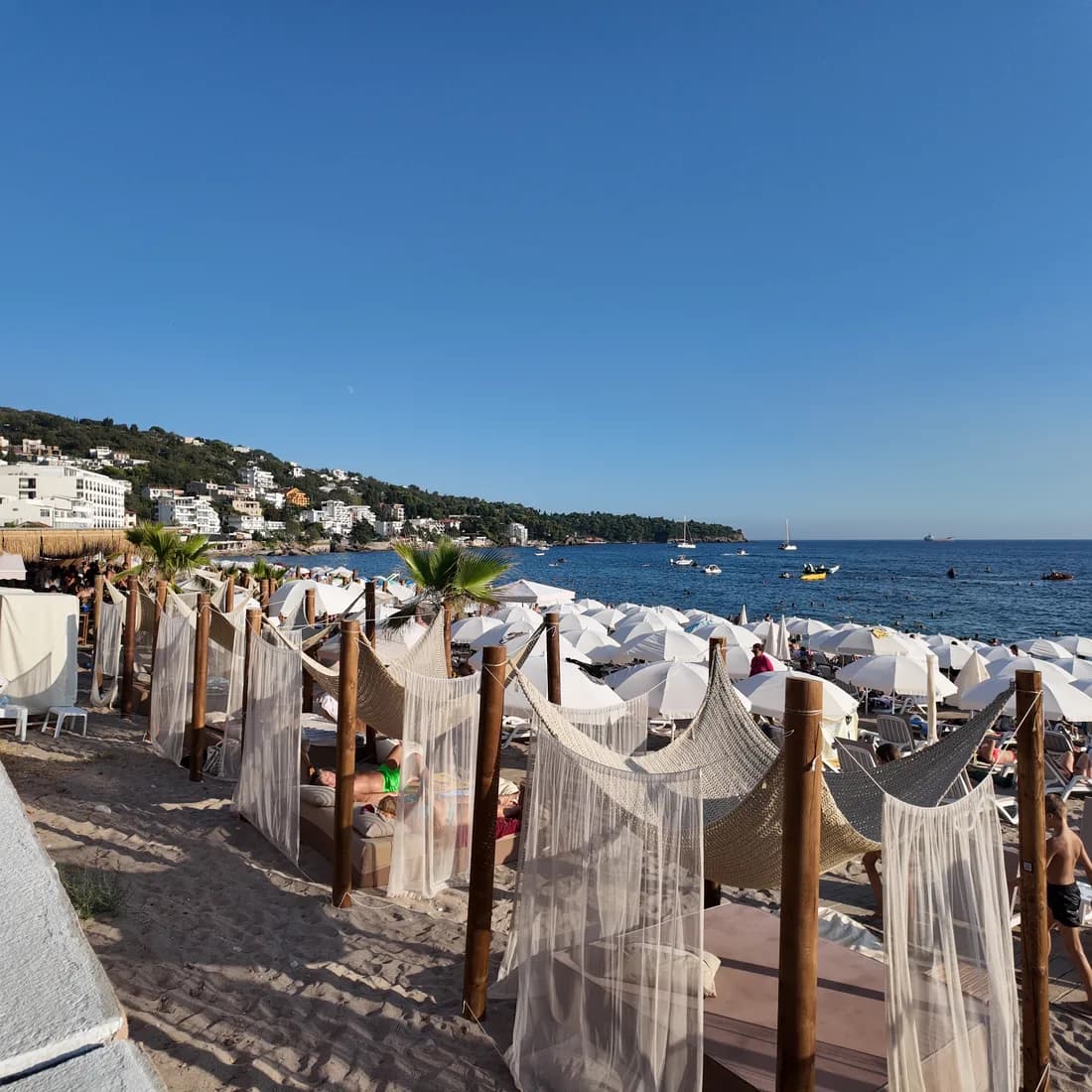 Beach cabanas giving shade on the sand at Sutomore