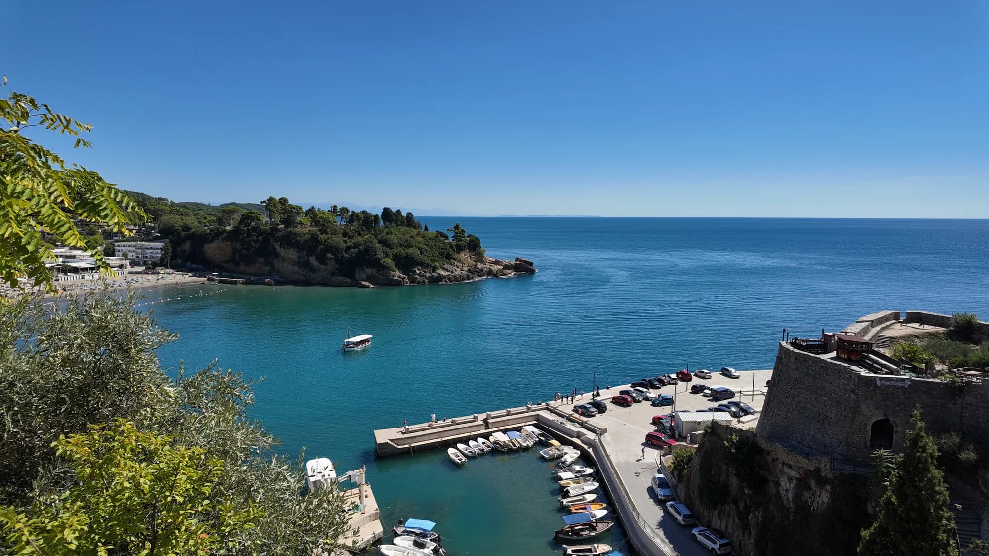 The walled Old Town of Ulcinj on its headland, the fishing harbour and the open sea below it