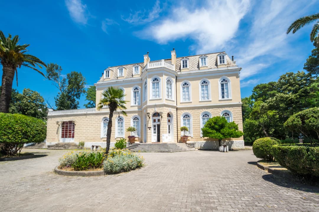 King Nikola's Palace in Bar's Topolica district, its pale stone residence and grounds set back from the seafront.