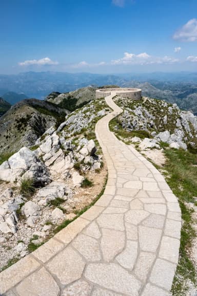 Stone path climbing toward Jezerski Vrh on Lovćen