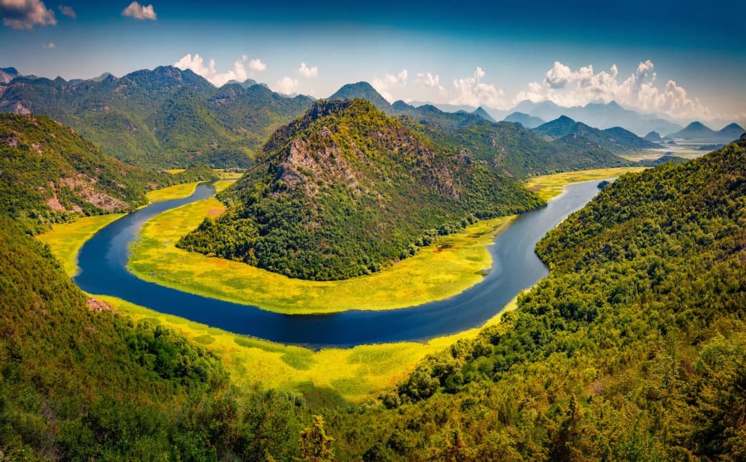 Meandering waterway through the green Lake Skadar landscape