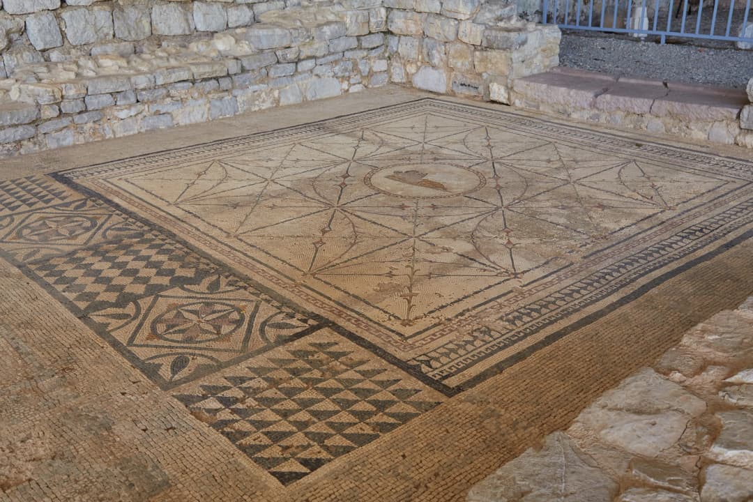 Roman mosaic floor with a central reclining figure at Risan