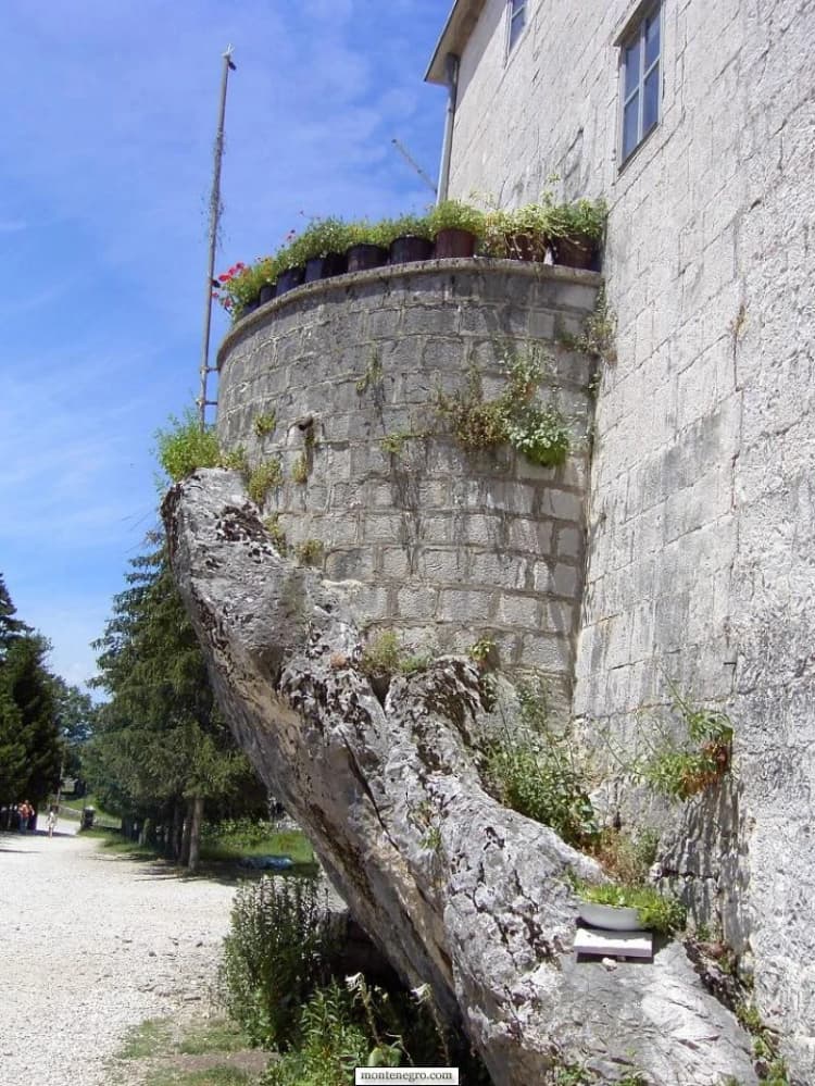 Narrow stone balcony and arches at the Upper Ostrog Monastery
