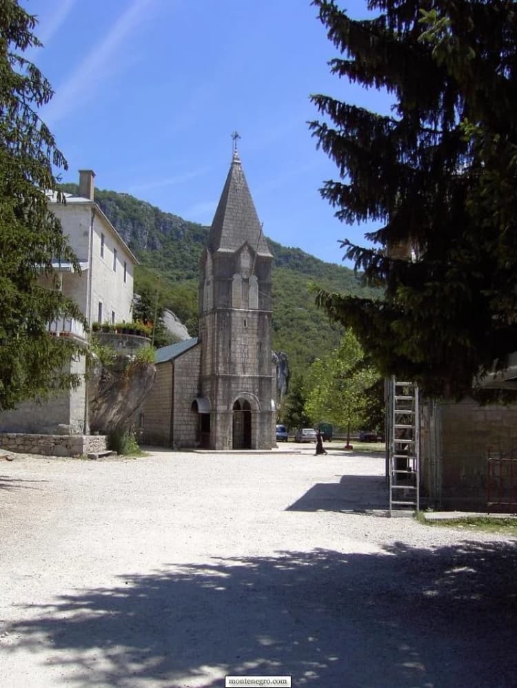 Stone church and bell tower in the Lower Ostrog Monastery complex