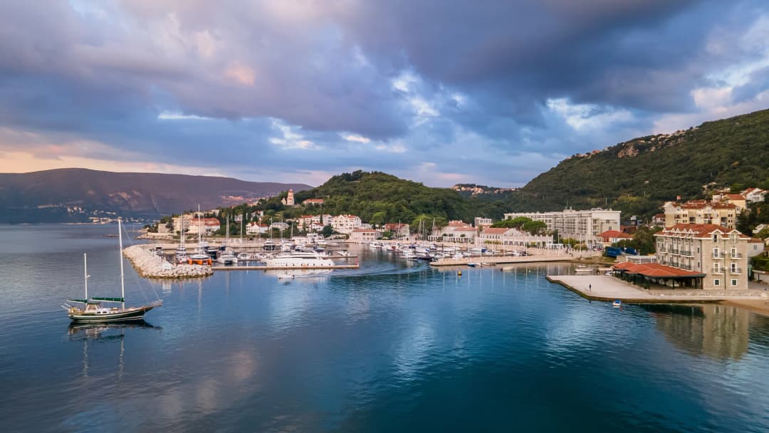 Meljine waterfront, Lazure marina and Savina hillside viewed from the bay
