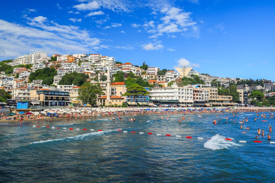 Mala Plaža town beach in Ulcinj seen from the water, crowded in summer
