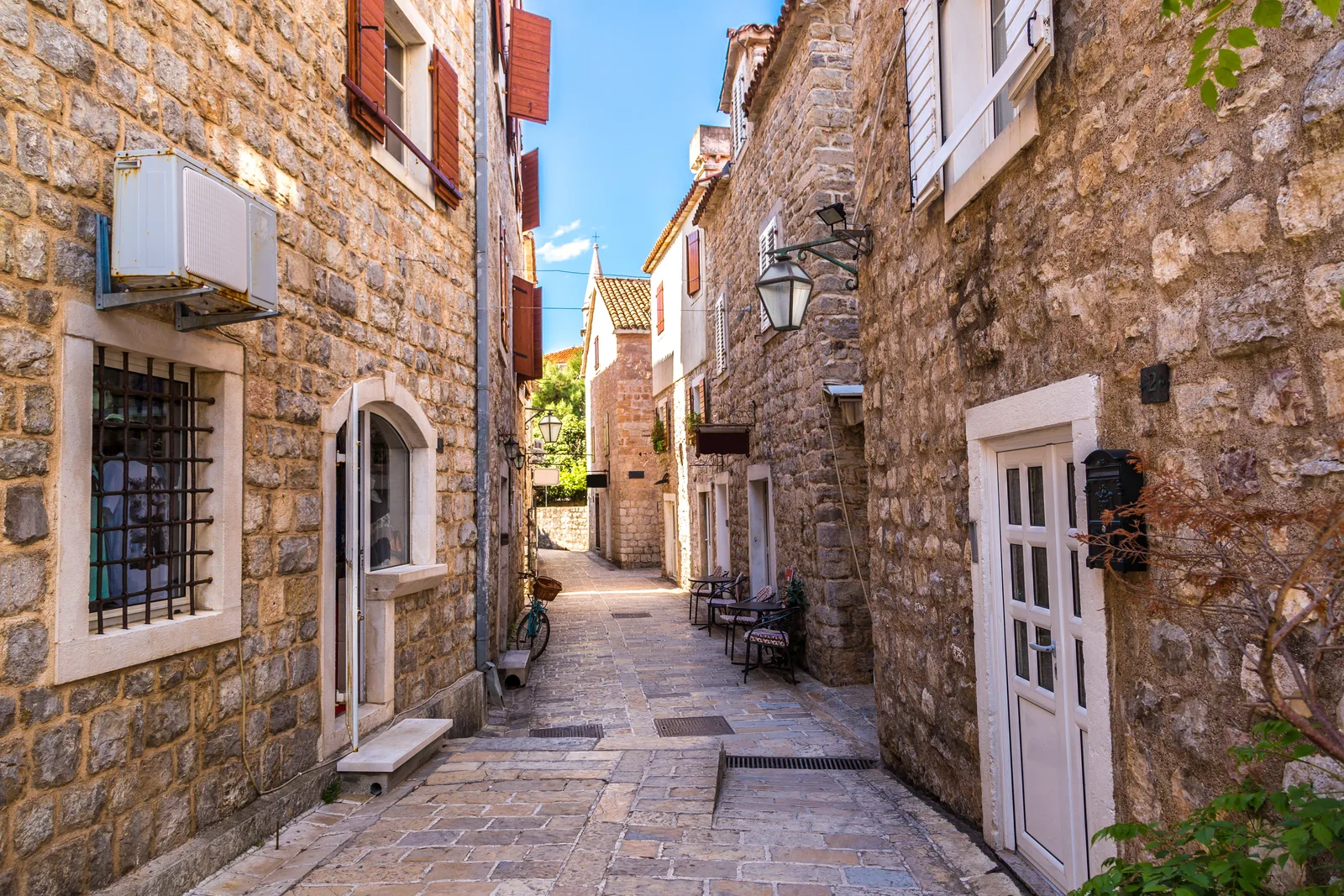 Narrow cobbled stone lane inside Budva's medieval Old Town