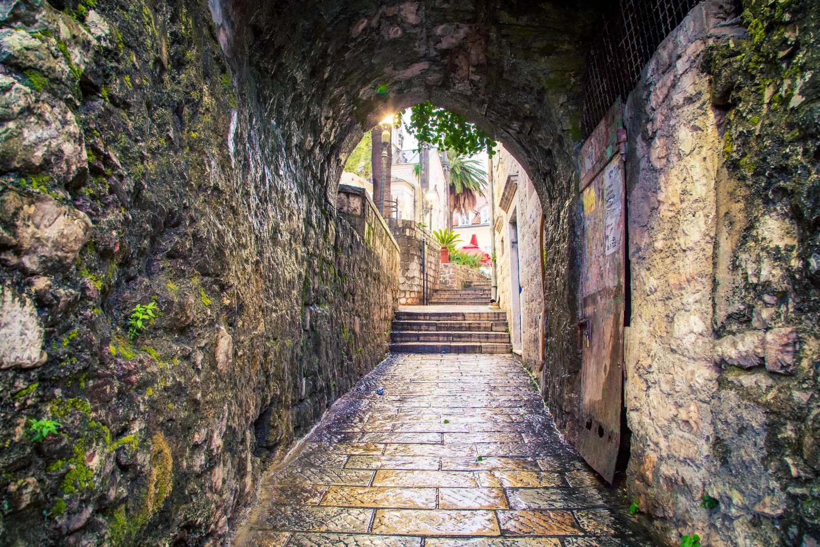 A vaulted stone passage and steps in Herceg Novi's medieval Old Town