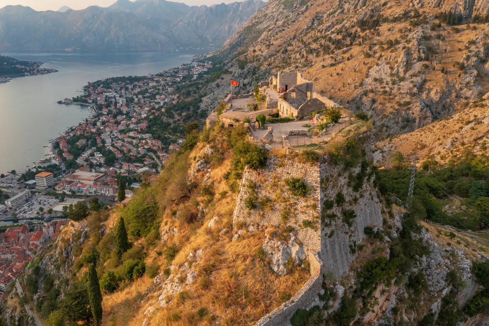 Aerial view of the Kanli Kula fortress above the rooftops of Herceg Novi and the Bay of Kotor