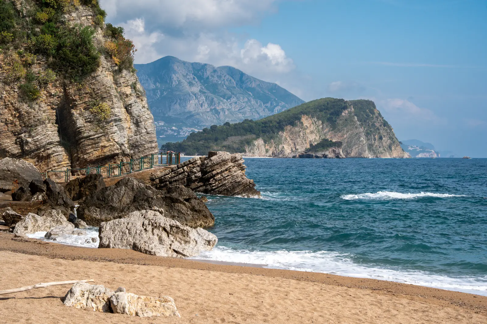 Mogren beach near Budva Old Town with cliffs and the Adriatic Sea