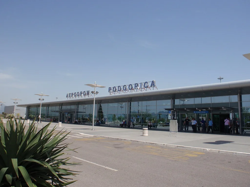 Golubovci today, the low-rise settlement spread across the flat Zeta plain south of Podgorica.